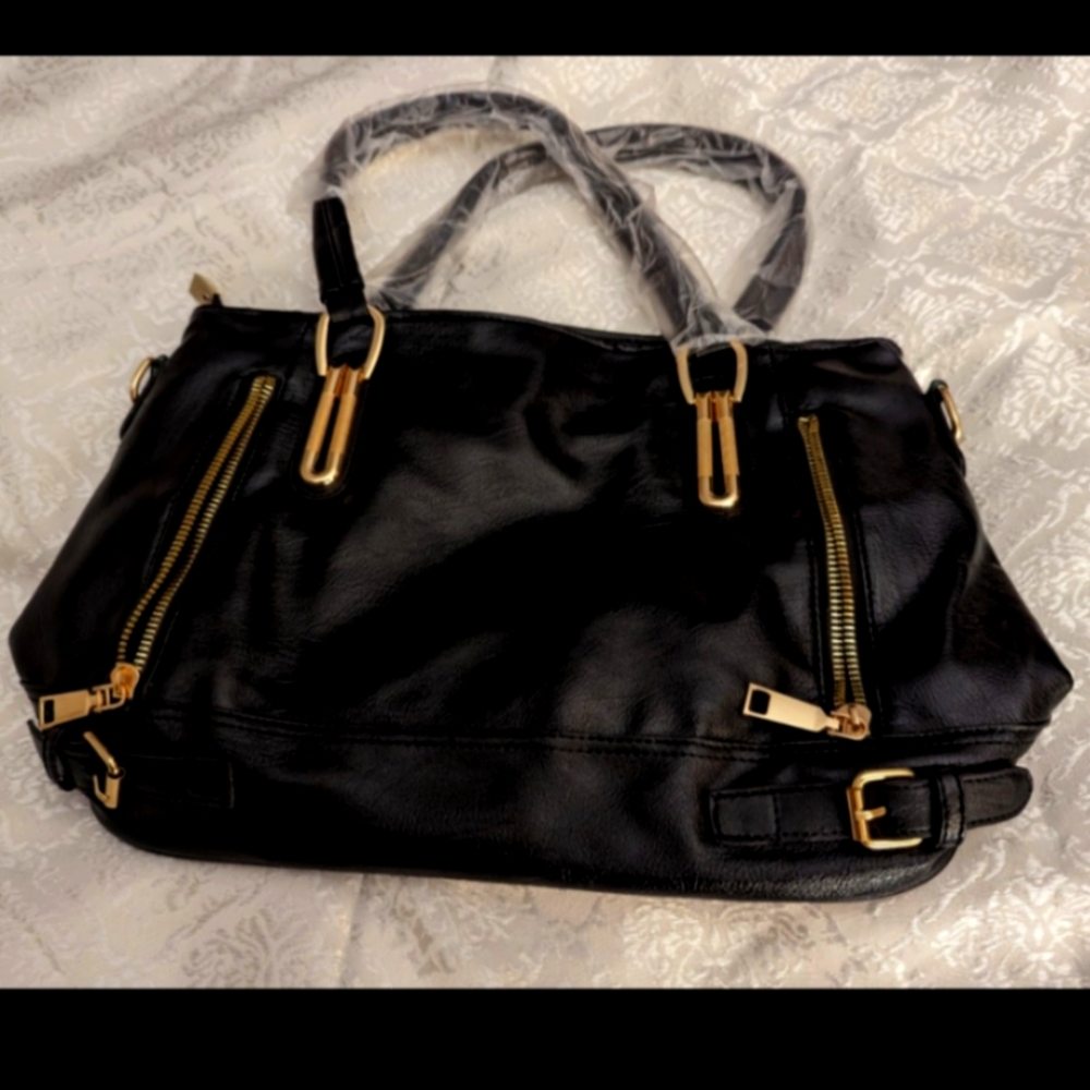 Chic Black Shoulder Bag with Gold Hardware and Slouchy Design
